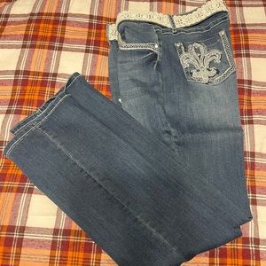 Blue jeans with rhinestone design and belt